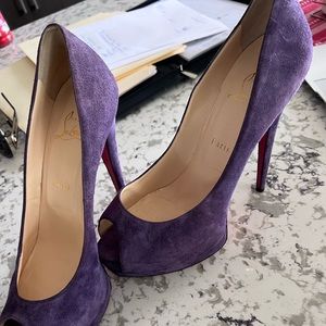 Christian Loubitins barely worn In A1condition royal purple is a eyecatcher